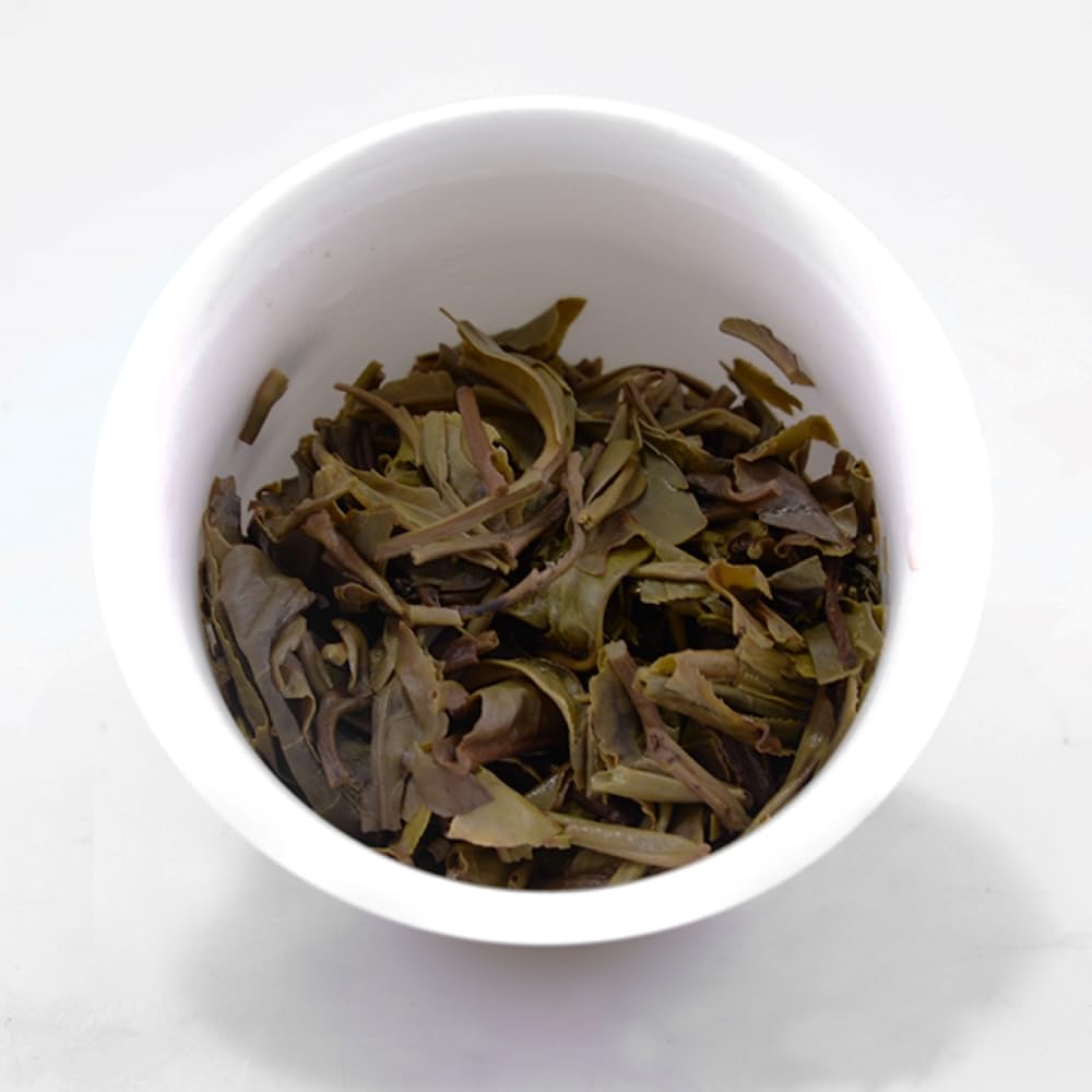 2015 Dovji Yi Wu Raw Pu-erh Tea Cake, 357g, from Yunnan