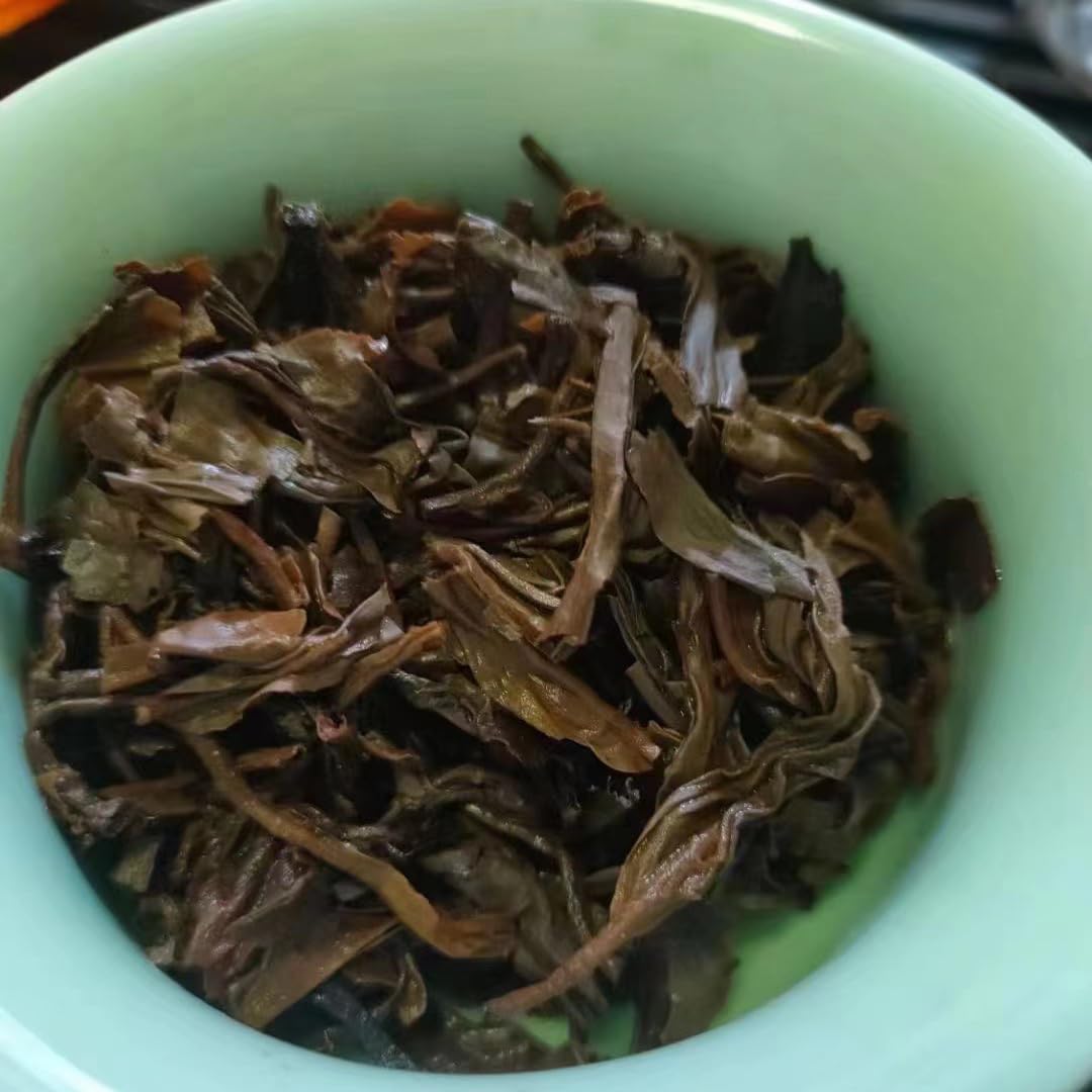 2010 Yongle Shuang Shi Tong Qing Hao Raw Pu-erh Tea Cake, 357g, from Yunnan