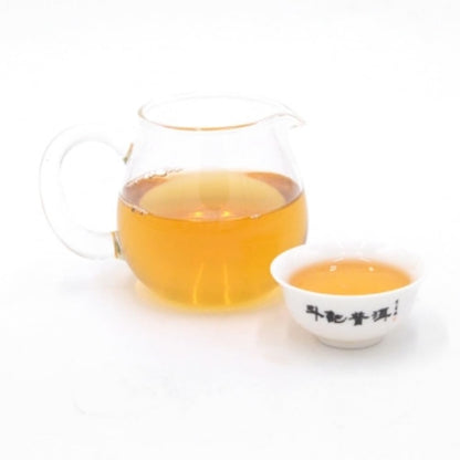 2014 Dovji Xuanhuadou Raw Pu-erh Tea Cake, 357g, from Yunnan
