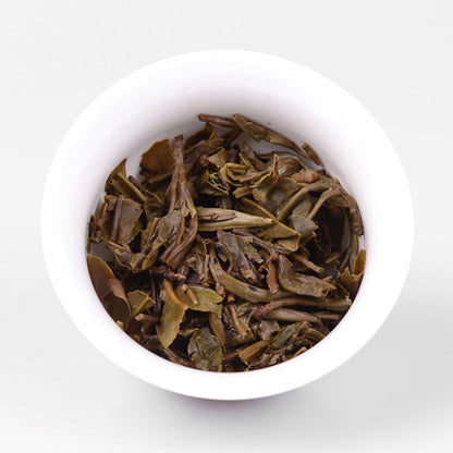 2014 Dovji Xuanhuadou Raw Pu-erh Tea Cake, 357g, from Yunnan