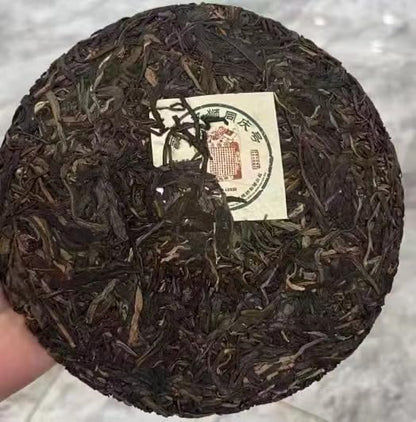2010 Yongle Shuang Shi Tong Qing Hao Raw Pu-erh Tea Cake, 357g, from Yunnan