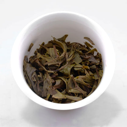 2015 Dovji Yi Wu Raw Pu-erh Tea Cake, 357g, from Yunnan