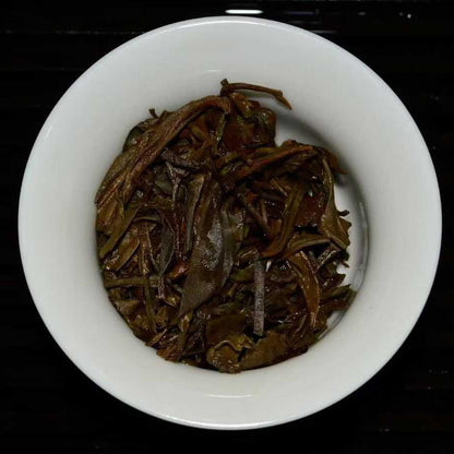 2004 Tongxing Hao Vintage Raw Pu-erh Tea Cake - 357g