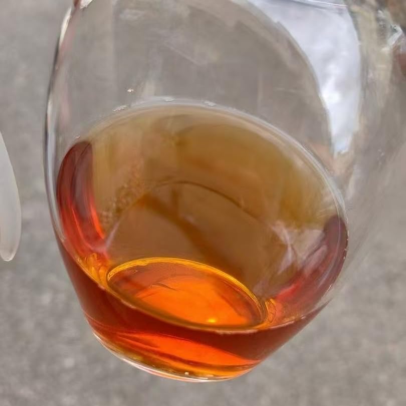 1970s Tian Xinhao Raw Pu-erh Tea Cake, 357g, from Yunnan