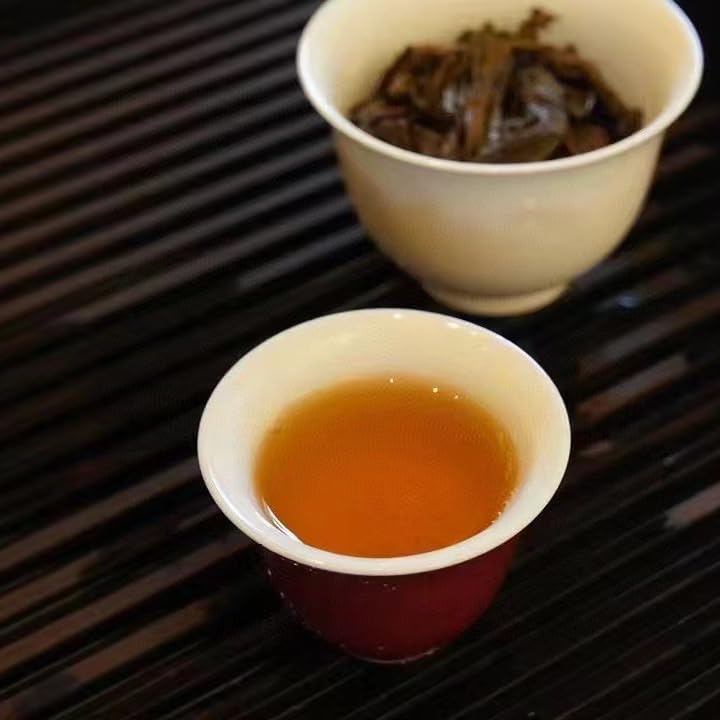 Yiwu Tea King Ancient Tree Raw Pu-Erh Tea 2006 – 357g
