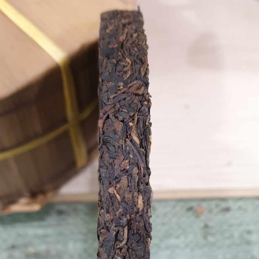 1999 China Tea Provincial Company Dry Storage Iron Discus Raw Pu-erh Tea Cake, 357g