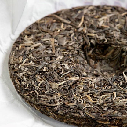 2023 Yi Wu Ming Qian Chunjian Raw Pu-erh Tea Cake, 357g, from Yunnan