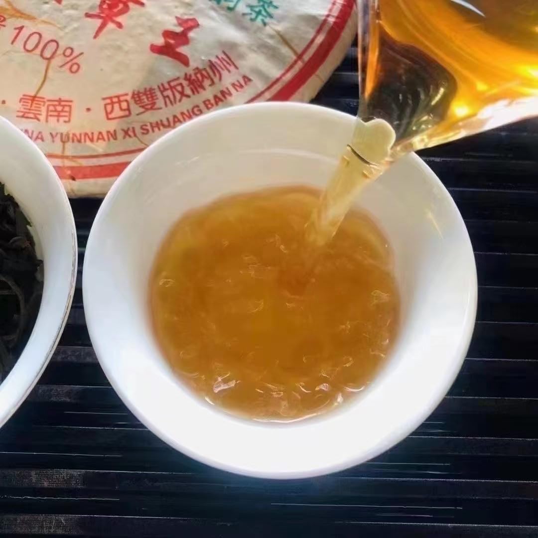 Xinghai Tea Factory Ancient Tree Ban Zhang King Raw Pu-Erh Tea 2006 – 357g