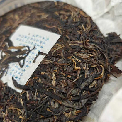 2010 Tong Chang Hao Yi Bang Wild Ancient Tree Raw Pu-erh Tea Cake 357g