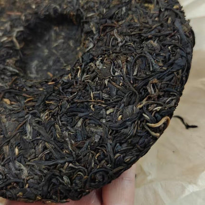 2005 Yunnan Caoguodi Seven Cake Raw Pu-erh Tea, 357g
