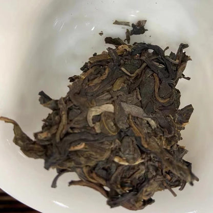 Fujin Tea Factory Zhen Cang Qing Bing Raw Pu-Erh Tea 2012 – 357g