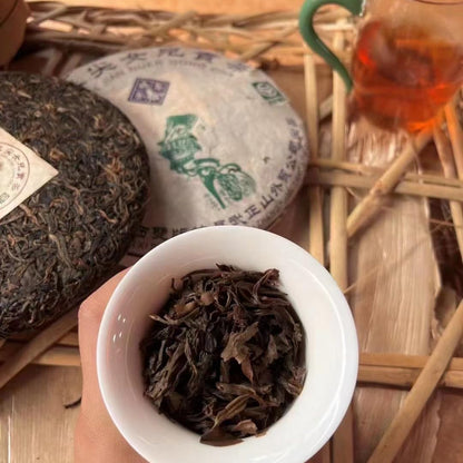 Yiwu Mountain Spring Tip Daughter Tribute Tea 2003 Raw Pu-Erh Tea Cake 357g