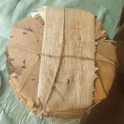 1980s 'Double Flower Mark' Raw Pu-erh Tea Cake, 357g, Aged in Hong Kong Traditional Storage, from Yunnan