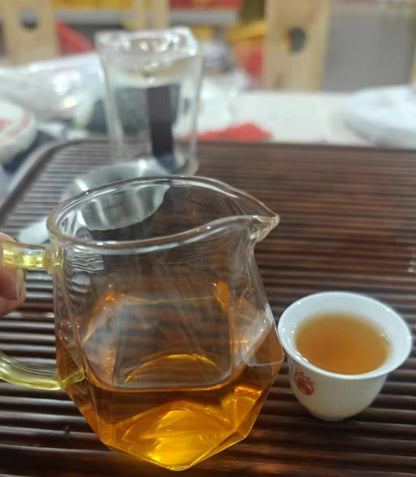 2012 Man Zhuan Ancient Trees Raw Pu-erh Tea Cake, 357g, from Yunnan