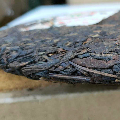 Pu-Erh tea,Late 1990s,Hong Kong customization Yunnan Qizi Cake Tea Water Blue Seal,357g,Raw