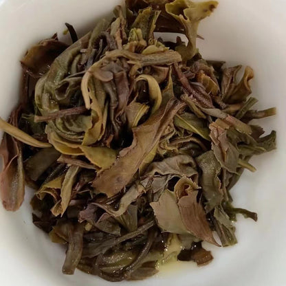 Fujin Tea Factory Zhen Cang Qing Bing Raw Pu-Erh Tea 2012 – 357g