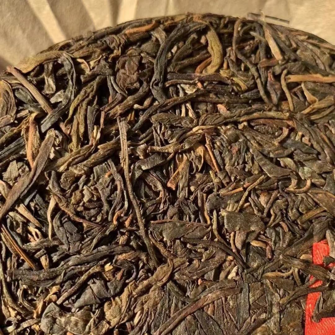 Yiwu Tea King Ancient Tree Raw Pu-Erh Tea 2006 – 357g