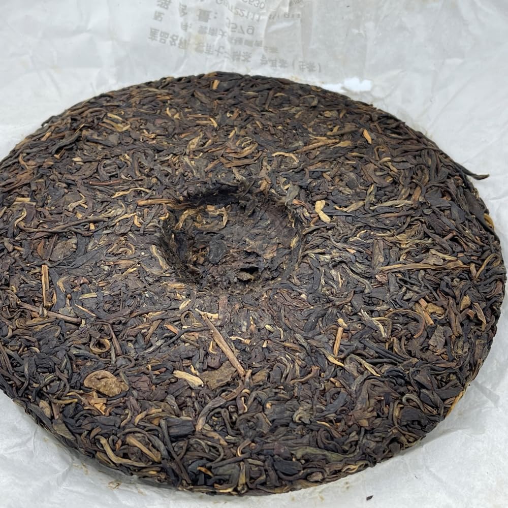 Pu-Erh tea,2011,SIX FAMOUS TEA MOUNTAIN,Auspicious Lion,357,Raw