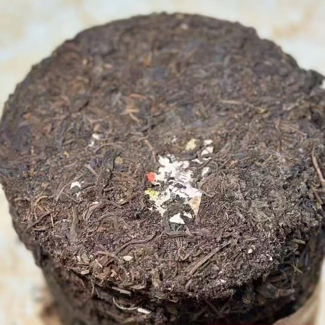 1980s 'Double Flower Mark' Raw Pu-erh Tea Cake, 357g, Aged in Hong Kong Traditional Storage, from Yunnan