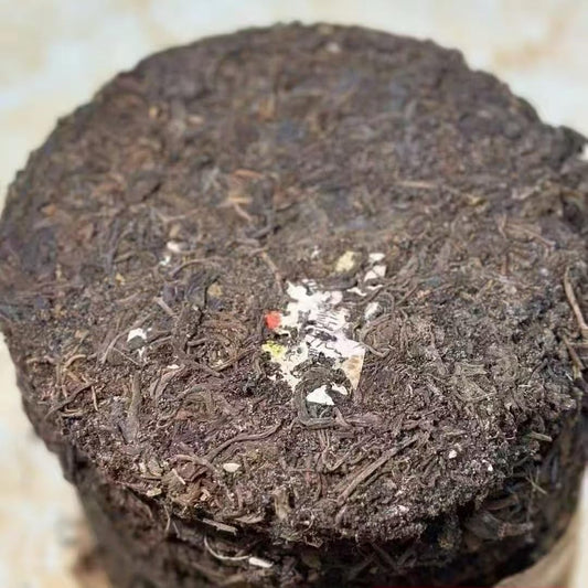 1980s 'Double Flower Mark' Raw Pu-erh Tea Cake, 357g, Aged in Hong Kong Traditional Storage, from Yunnan