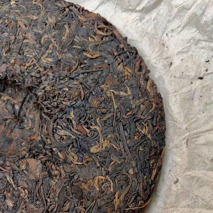 1970s Tian Xinhao Raw Pu-erh Tea Cake, 357g, from Yunnan