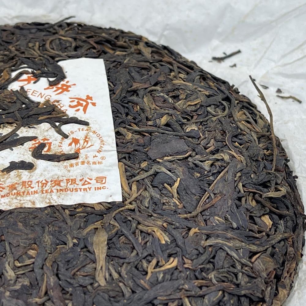 Pu-Erh tea,2012,SIX FAMOUS TEA MOUNTAIN,Chrysanthemum,357,Raw