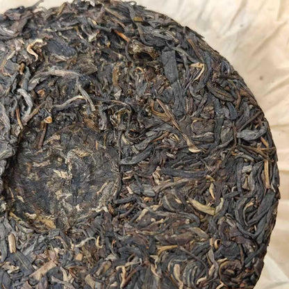 2005 Vintage Che Shun Hao Yiwu Ancient Tree Raw Pu-erh Tea Cake (357g)