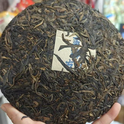 2012 Man Zhuan Ancient Trees Raw Pu-erh Tea Cake, 357g, from Yunnan