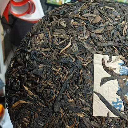 2012 Man Zhuan Ancient Trees Raw Pu-erh Tea Cake, 357g, from Yunnan