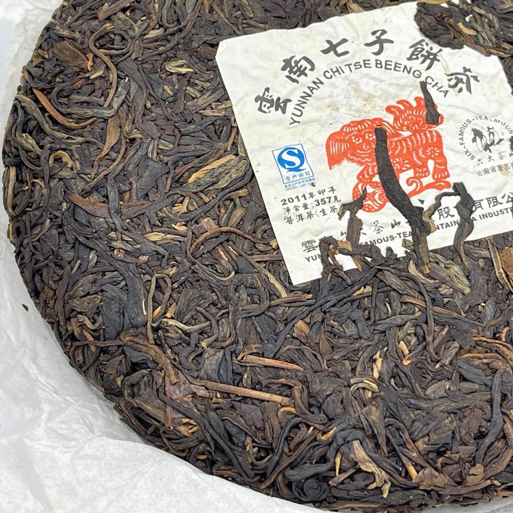 Pu-Erh tea,2011,SIX FAMOUS TEA MOUNTAIN,Auspicious Lion,357,Raw