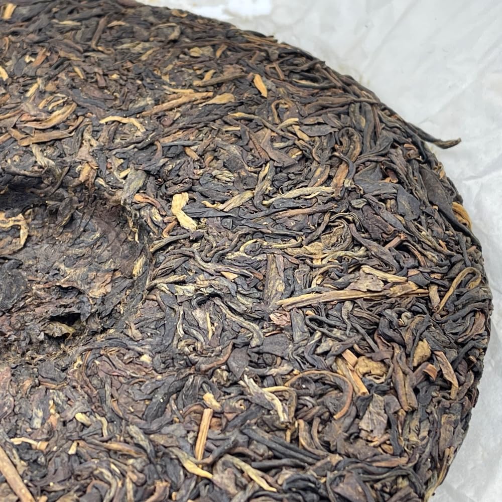 Pu-Erh tea,2011,SIX FAMOUS TEA MOUNTAIN,Auspicious Lion,357,Raw