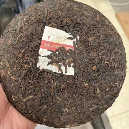 Li Ming Xinghuo Tea Factory Nannuo Mountain Ripe Pu-Erh Tea 2011 – 357g