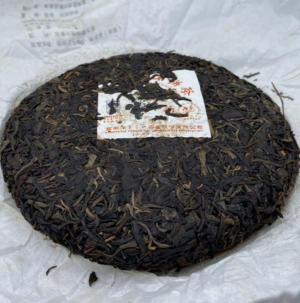Pu-Erh tea,2012,SIX FAMOUS TEA MOUNTAIN,Chrysanthemum,357,Raw