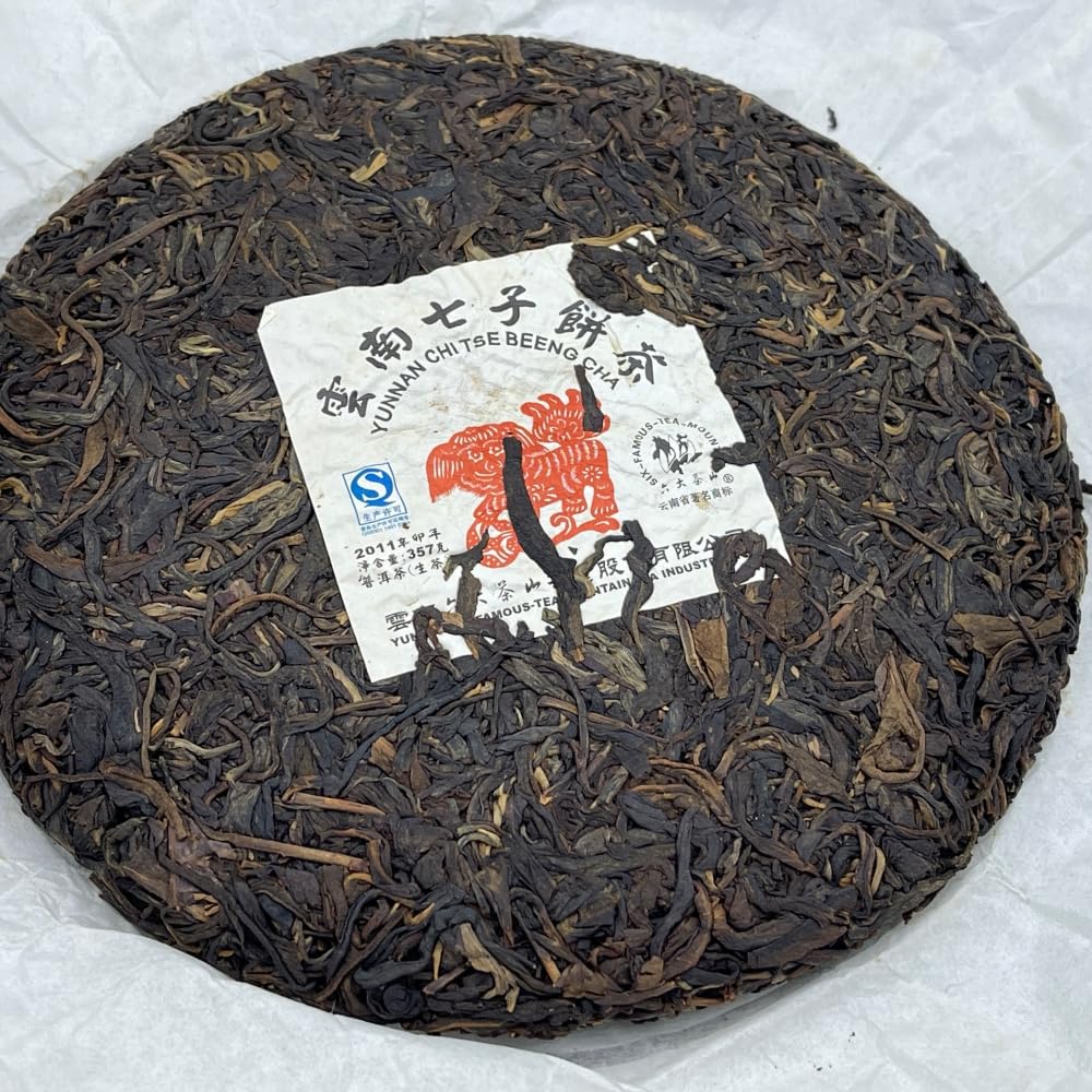 Pu-Erh tea,2011,SIX FAMOUS TEA MOUNTAIN,Auspicious Lion,357,Raw
