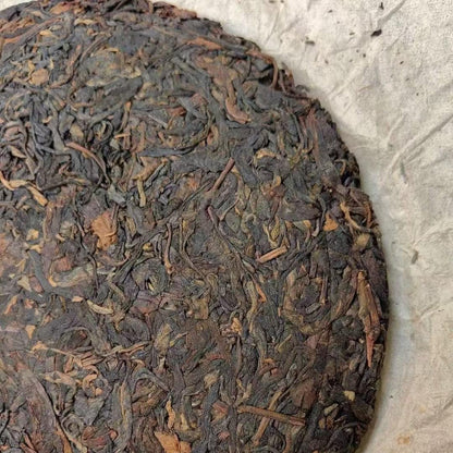1970s Tian Xinhao Raw Pu-erh Tea Cake, 357g, from Yunnan