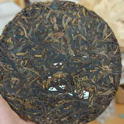 2004 Tongxing Hao Vintage Raw Pu-erh Tea Cake - 357g