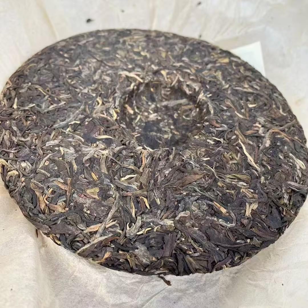 Xinghai Tea Factory Ancient Tree Ban Zhang King Raw Pu-Erh Tea 2006 – 357g