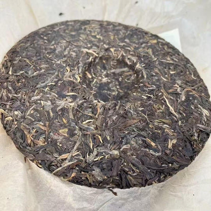 Xinghai Tea Factory Ancient Tree Ban Zhang King Raw Pu-Erh Tea 2006 – 357g