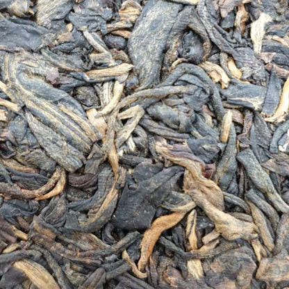 1999 China Tea Provincial Company Dry Storage Iron Discus Raw Pu-erh Tea Cake, 357g