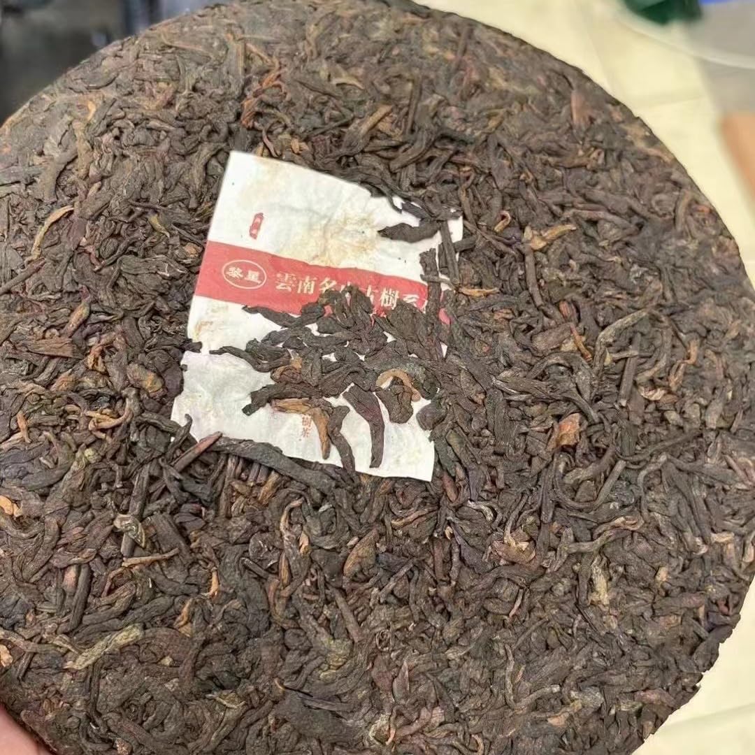 Li Ming Xinghuo Tea Factory Nannuo Mountain Ripe Pu-Erh Tea 2011 – 357g