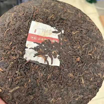 Li Ming Xinghuo Tea Factory Nannuo Mountain Ripe Pu-Erh Tea 2011 – 357g