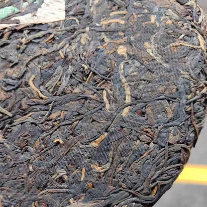 2004 Spring Ming Tea Factory Banzhang “Big Cabbage” Raw Pu-erh Cake 357g, Bamboo Basket Pack
