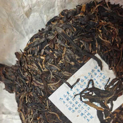 2010 Tong Chang Hao Yi Bang Wild Ancient Tree Raw Pu-erh Tea Cake 357g