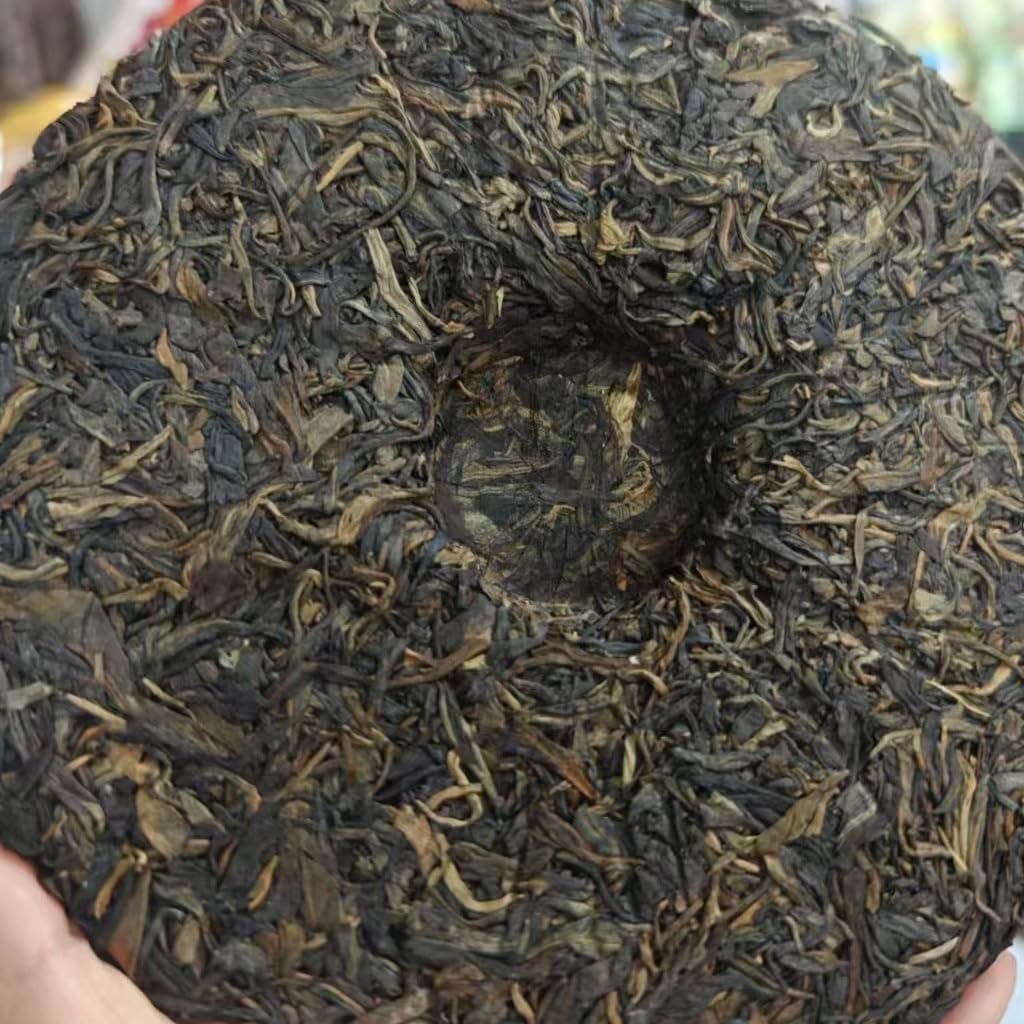 2012 Man Zhuan Ancient Trees Raw Pu-erh Tea Cake, 357g, from Yunnan