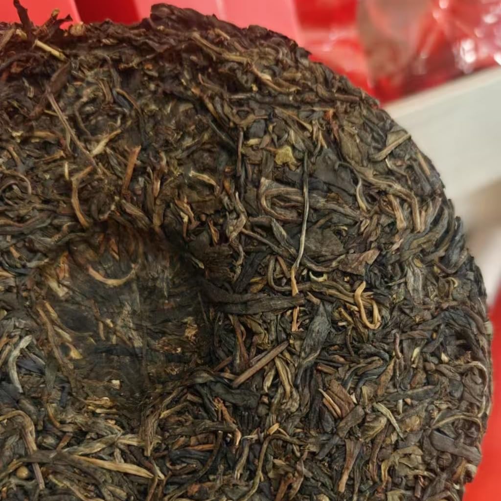 2009 Yiwu Longtanqing Raw Pu-erh Tea Cake, 357g, from Yunnan