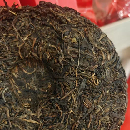 2009 Yiwu Longtanqing Raw Pu-erh Tea Cake, 357g, from Yunnan