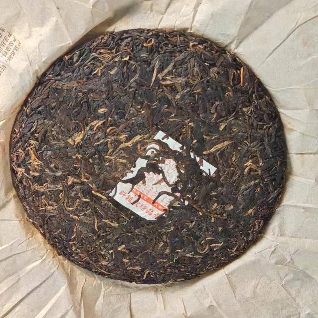 2009 Chunhai Tea Factory Xuanyuan Hao Raw Pu-erh Tea Cake, 357g, from Yunnan