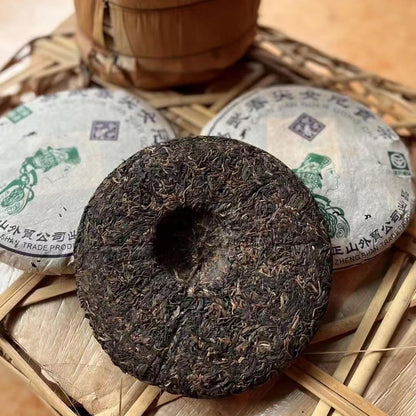 Yiwu Mountain Spring Tip Daughter Tribute Tea 2003 Raw Pu-Erh Tea Cake 357g