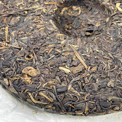 Pu-Erh tea,2011,SIX FAMOUS TEA MOUNTAIN,Auspicious Lion,357,Raw