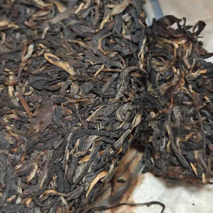 2010 Tong Chang Hao Yi Bang Wild Ancient Tree Raw Pu-erh Tea Cake 357g